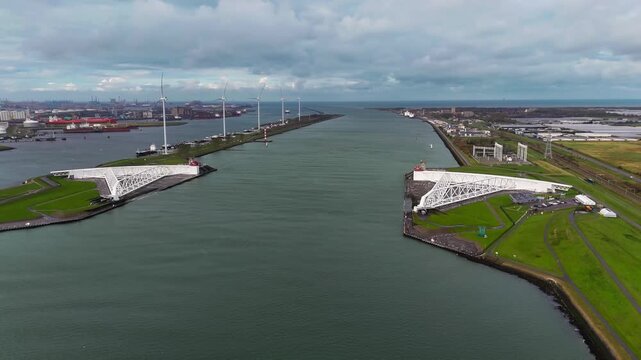 The Maeslantkering, or Maeslant barrier, is a storm barrier in the Rhine Delta in the Netherlands for flood protection. It is one of the largest moving structures on Earth. High quality 4k footage