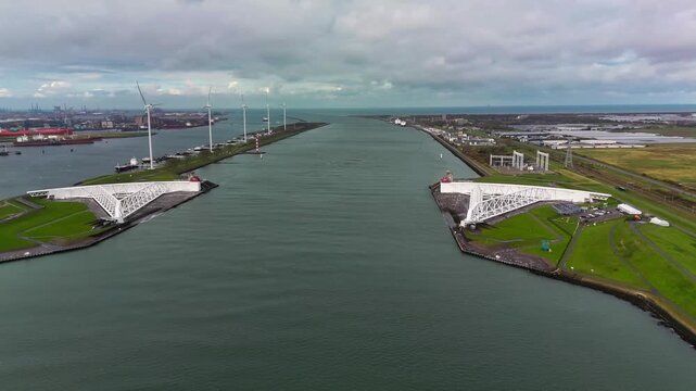 The Maeslantkering, or Maeslant barrier, is a storm barrier in the Rhine Delta in the Netherlands for flood protection. It is one of the largest moving structures on Earth. High quality 4k footage