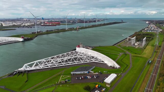 The Maeslantkering, or Maeslant barrier, is a storm barrier in the Rhine Delta in the Netherlands for flood protection. It is one of the largest moving structures on Earth. High quality 4k footage