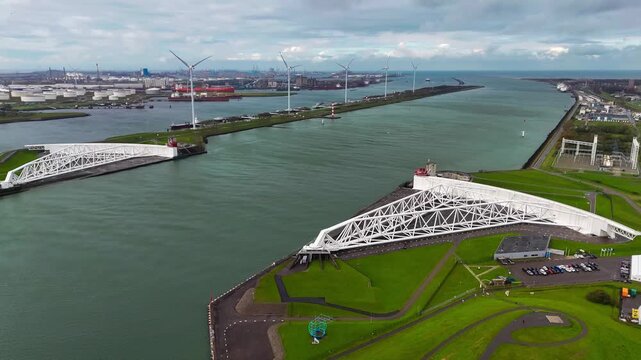 The Maeslantkering, or Maeslant barrier, is a storm barrier in the Rhine Delta in the Netherlands for flood protection. It is one of the largest moving structures on Earth. High quality 4k footage
