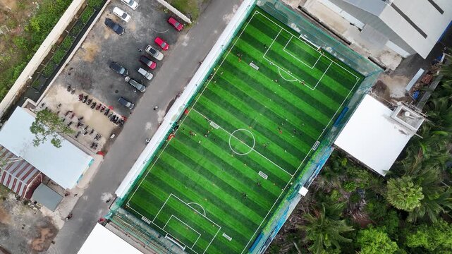 Aerial view of a mini football match, soccer. MiniFootball field and Mini soccer at day