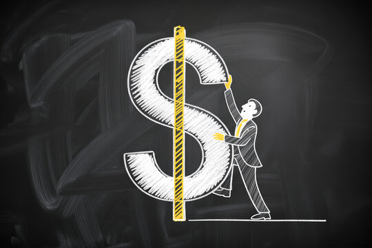 A businessman attempts to lift a large dollar sign drawn on a chalkboard.