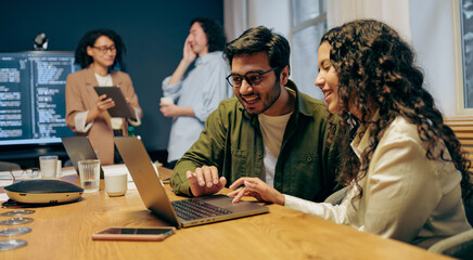 Team Design Collaboration, Designers And Developer Collaborate On Prototype Adjustments In Bright Office