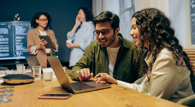 Team Design Collaboration, Designers And Developer Collaborate On Prototype Adjustments In Bright Office