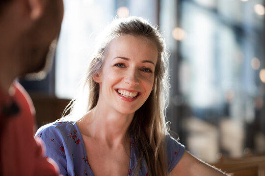 Porrait of smiling woman in a cafe