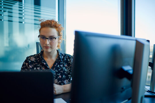 Businesswoman working at desk in office