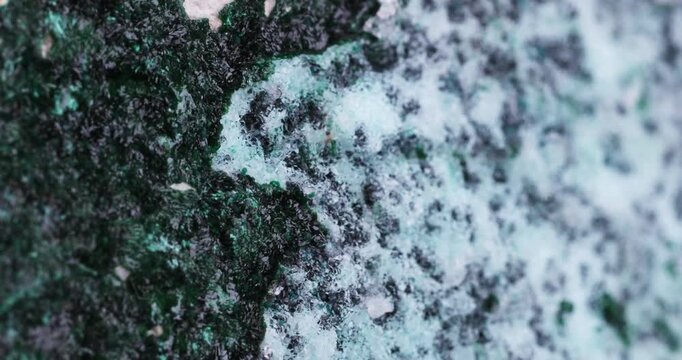 Malachite and Quartz on Chrysocolla. Specimen from Tenke Fungurume, DR Congo. macro footage detail texture background. close-up mineral crystal unpolished semi-precious gemstone