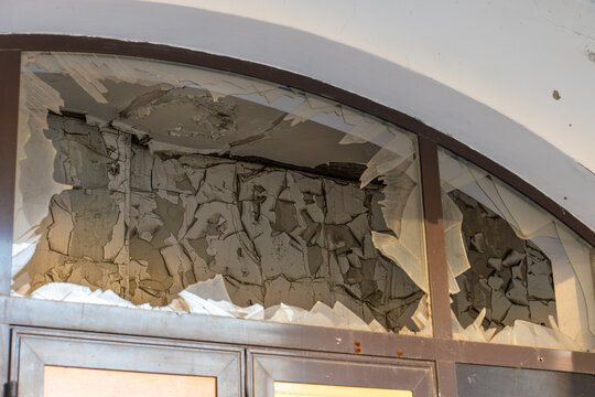 Irpin, Ukraine - 07 March 2026: View of shattered glass and crumbling facade at 31 Universitetska Street reveals a stark testament to the ravages of conflict.