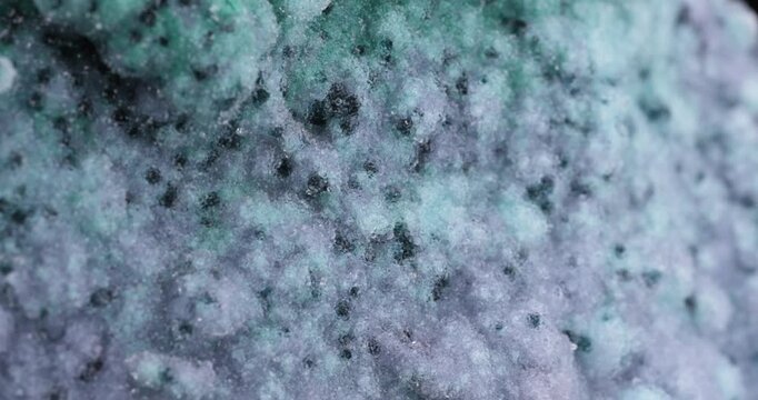 Malachite and Quartz on Chrysocolla. Specimen from Tenke Fungurume, DR Congo. macro footage detail texture background. close-up mineral crystal unpolished semi-precious gemstone