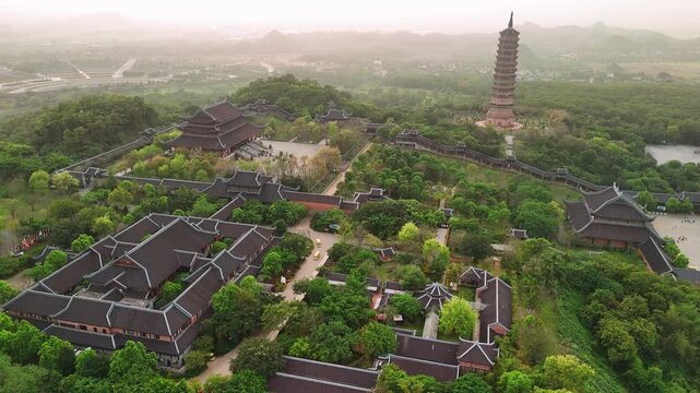 Aerial view of the bai dinh pagoda complex with its traditional temples and stupa in ninh binh, vietnam
