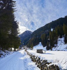 Beautiful winter hike in the Hollersbach Valley, in the Salzburg region near Bramberg, Austria.