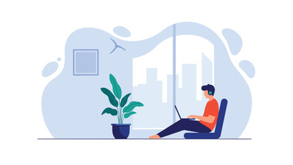 Fototapeta premium Young man sitting on the floor of a contemporary apartment working on his laptop with headphones while looking out at the city view.