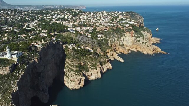 Drone aerial view of Cabo de la Nau lighthouse, Spain.