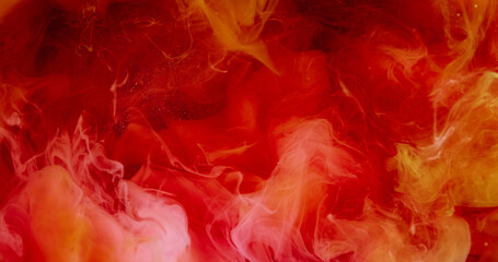 Naklejka premium Fume paint blend. Steam ink drop. Defocused red orange color glitter cloud fog water shiny splash spreading on abstract background.