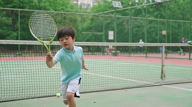 Happy family enjoying a lively game of tennis
