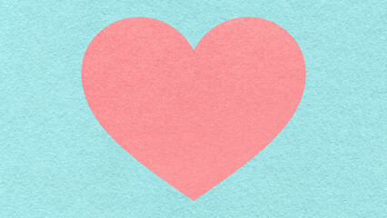 Obraz premium Pink heart on light turquoise paper texture background with copy space for Valentines Day banner, template or greeting card