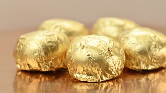 video of marzipan chocolates wrapped in foil