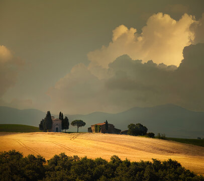 Cinematic Summer Landscape in Tuscany, Italy with Rolling Hills and Dramatic Sky