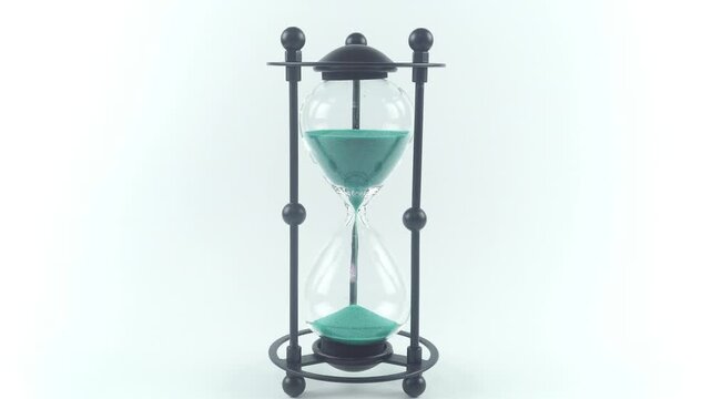 An Elegant Home Accessory In The Shape Of An Hourglass Made Of Metal And Gla