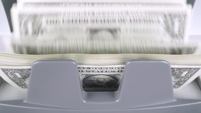 Machine For Counting And Checking The Authenticity Of Dollar Bills.