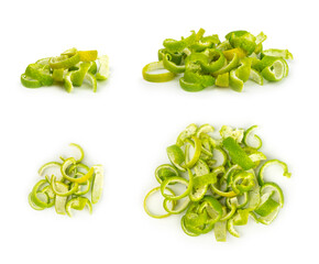 Fresh lime zest isolated on white background. Lime zest or peel close-up. Grated citrus peel. Lime...