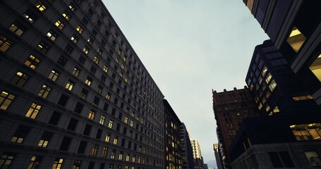 narrow avenue between historic office towers with glowing windows and lamplight, deep perspective lines draw eye toward distant skyline, atmosphere of evening © icetray