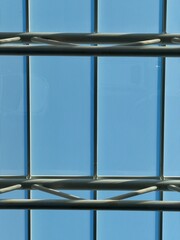 Abstract clear glass roofing covering an airport entrance
