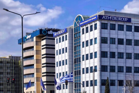 Exterior view of the Athens Stock Exchange (ATHEXGROUP) headquarters, alongside the International lottery operator ALLWYN (former OPAP), located on Leoforos (Avenue) Athinon in Athens, Greece.