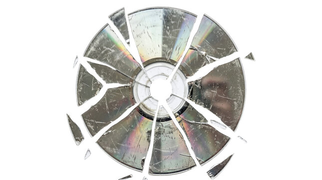 Smashed compact disk with cracked holographic surface and broken pieces on a transparent background