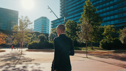 Businesswoman In Modern City Square During Daylight © Andrii Nekrasov
