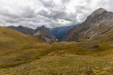 Obraz premium Cerces massif landscape under a moody cloudy sky and high‑altitude atmosphere in the French Alps