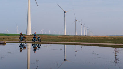 Exploring the scenic wind farms of Urk in Flevoland, Netherlands on a sunny day