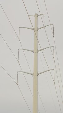 Power transmission pylons electrical grid infrastructure. Vertical video
