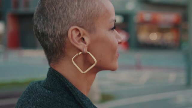 Stylish Woman With Short Hair Smiles On City Street