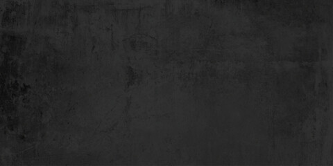 Obraz premium Dark grunge background with copy space featuring a textured black stone wall and vintage gray concrete surface for a rough blank backdrop design