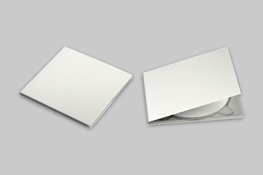 CD disc and carton packaging cover template mock up. Digipak case of cardboard CD drive. With white blank for branding design or text. Isolated on a background. 3d rendering.