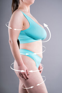 Unrecognizable curvy woman in underwear with arrows on fat body, concept of full body liposuction, plastic surgery, lifting and body contouring