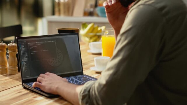 Male remote coder developing binary code to build software systems on laptop, debugging data with programming language on terminal window. Command-line development, connectivity.