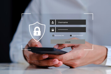 Person using smartphone with secure login interface showing username and password fields with shield and lock icon, representing mobile cybersecurity, identity authentication protection privacy
