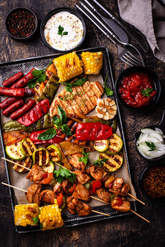 Assortment of grilled bbq meat and vegetables
