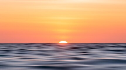 Obraz premium Peaceful Blurred Sea Sunset Scene with Subtle Texture and Professional Quality