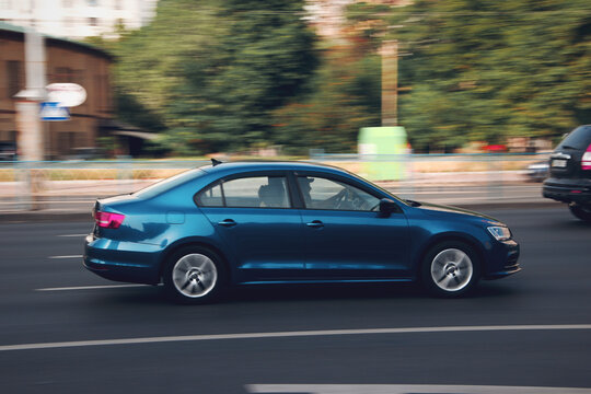 Ukraine, Kyiv - 16 July 2021: Blue Volkswagen Jetta car moving on the street. Editorial