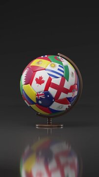 Globe shaped like a soccer ball spinning with the colors of the countries participating in the World Cup. Vertical composition. 3D animation.