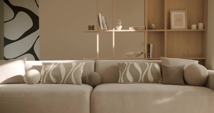 Timelapse of sunlight and shadows moving across a stylish modern living room with a beige sofa and wooden bookcase, creating a serene and warm atmosphere as the day passes