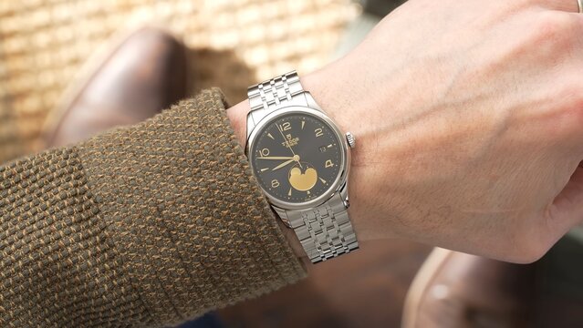 Tudor 1926 Luna, Luxury Swiss Watch. watch on the hand