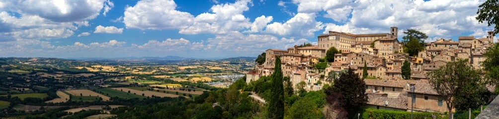 Todi Italy panorama 20000px high resolution 100MP hill top town view over Umbria valley golden sandstone architecture World Print quality wide angle landscape cinematic