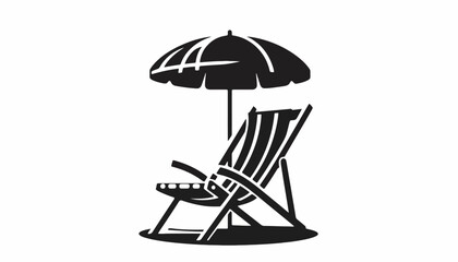 A beach chair sits under a parasol on sandy shore © dale