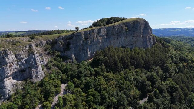 Aerial drone footage of flight along the Haute Pierre Mountain in the French Jura near Lods in France