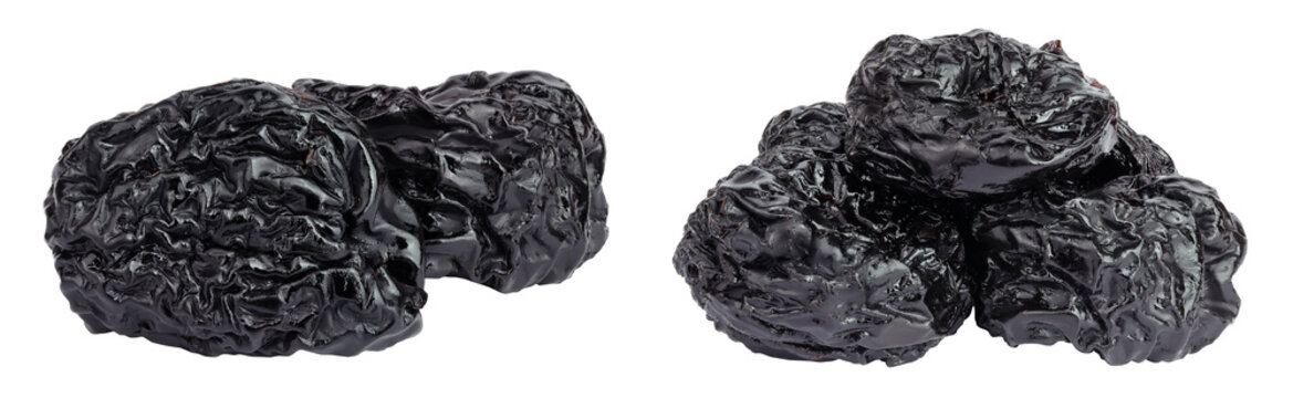 Prunes isolated on white background, heap of dried plums
