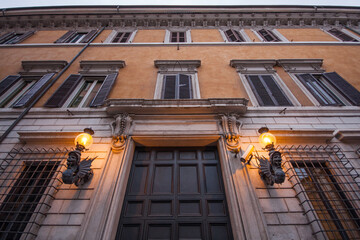A building facade with ornate details and a grand entrance.